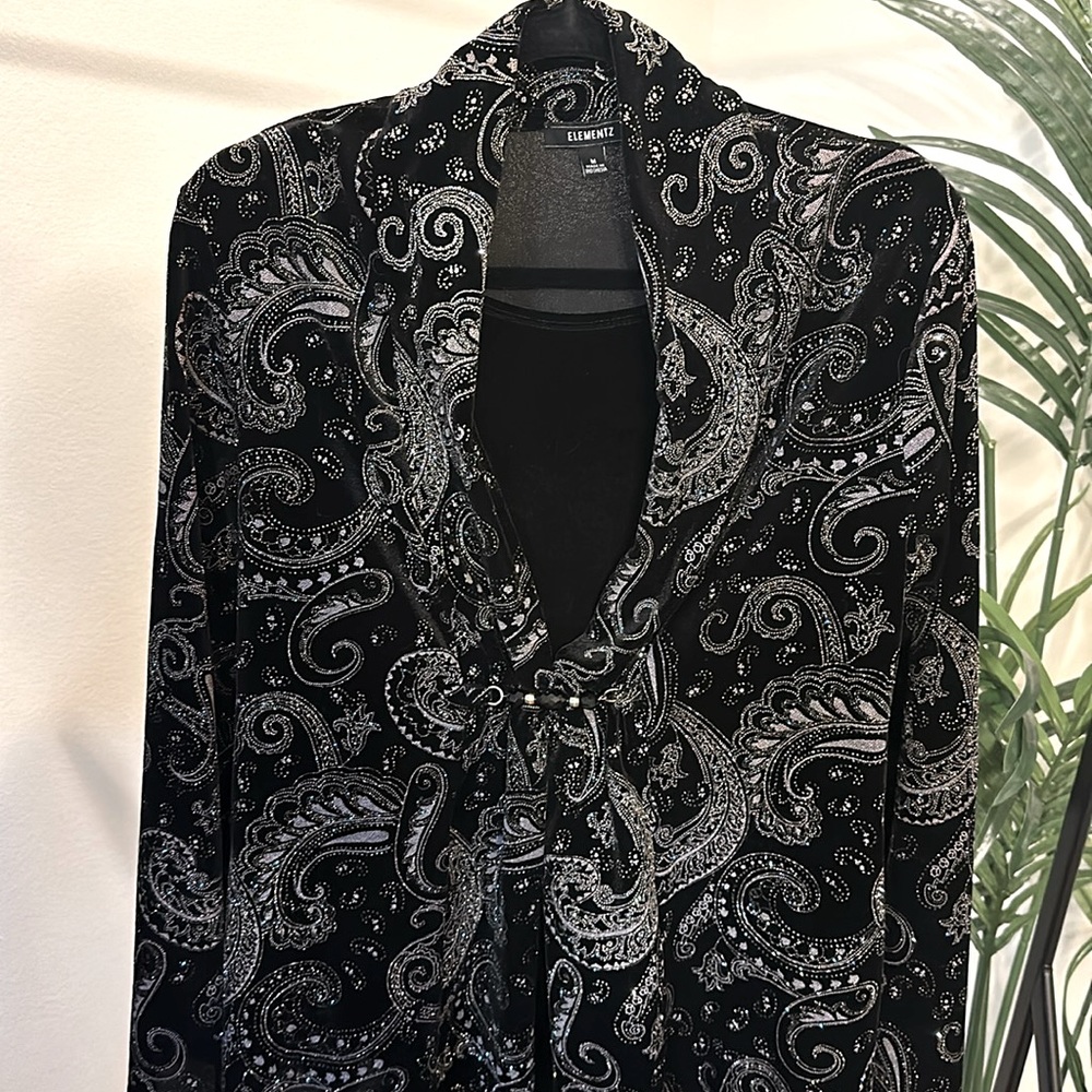 Fancy, long sleeve shirt.